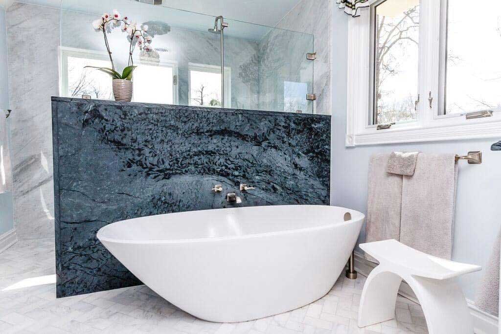 Beautiful master bath addition by BK Martin showing tub, shower, and bench.