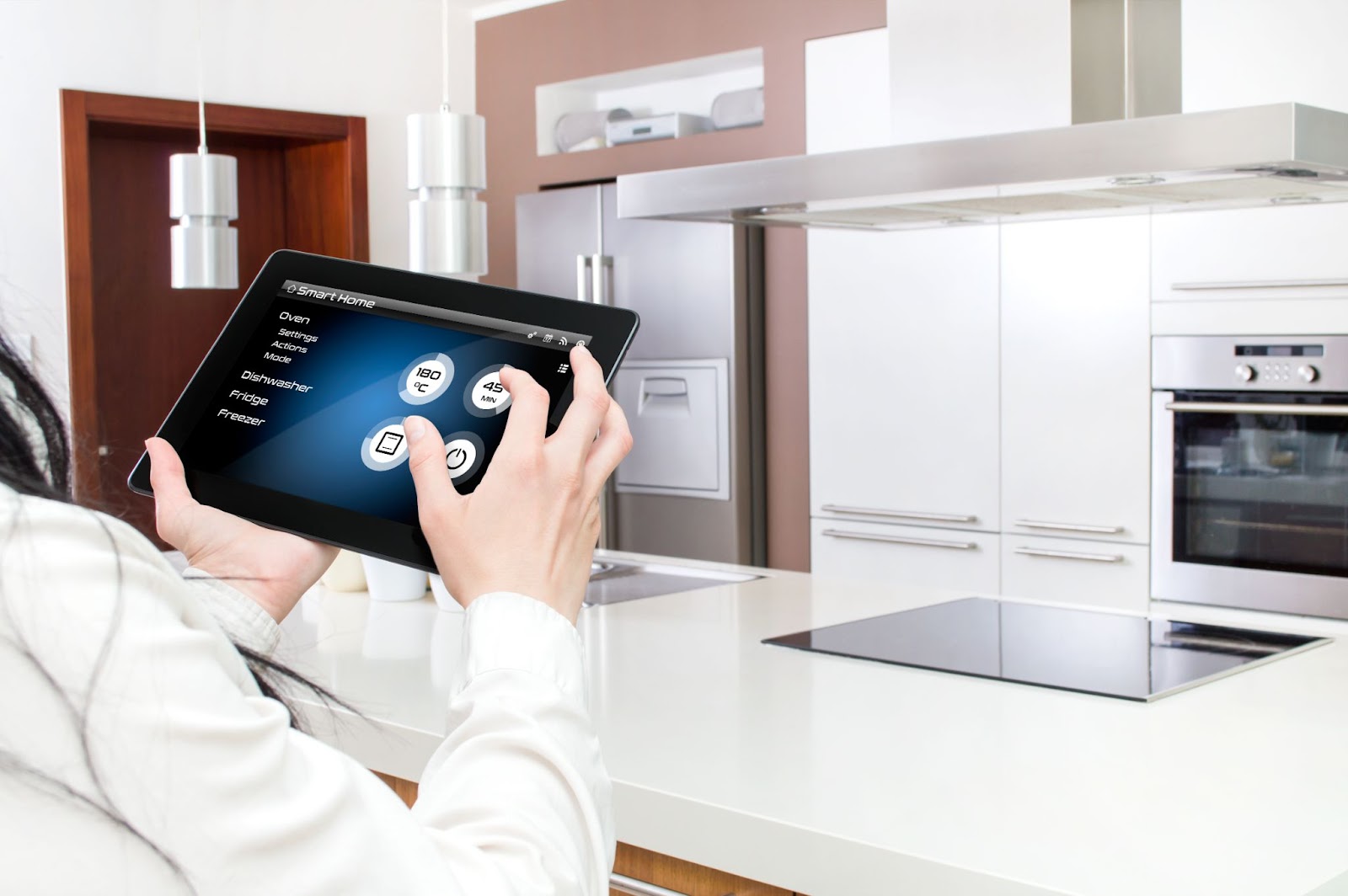 Smart kitchen controlled by tablet smart home hub.