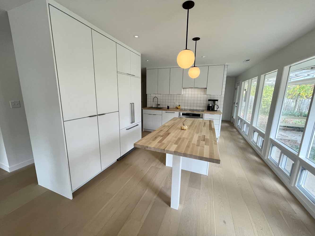 Wood, butcher block countertop on this BK Martin kitchen island